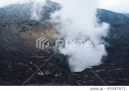 Photo of smoke volcano crater on Java island Photo of smoke volcano crater on Java island 65087671