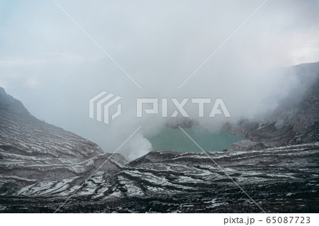 Photo of smoke volcano crater on Java island 65087723