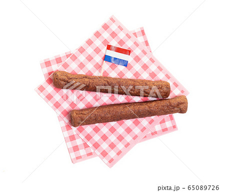 Two frikadellen on a napkin, a Dutch fast food 65089726