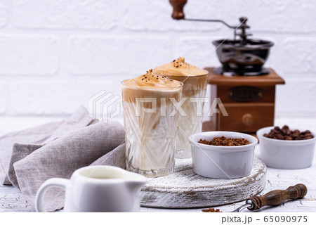 Dalgona whipped coffee with milk 65090975