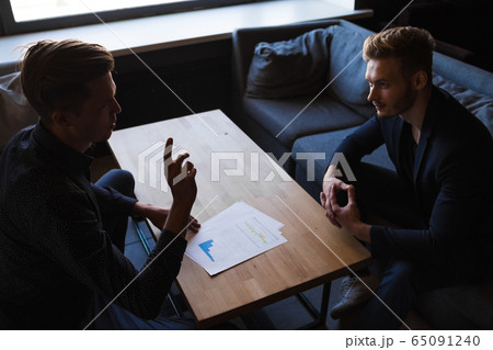 Businessmen congratulated themselves on their foresight in keeping out of it in cafe 65091240