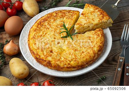 Spanish tortilla with potatoes and onion. Spanish tortilla with potatoes and onion. 65092506