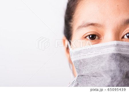 closeup woman wearing face mask protective against 65095439