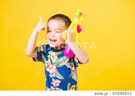 little children boy so happy in Songkran festival 65096833