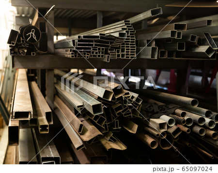 Steel shaped tubes on shelving rack Steel shaped tubes on shelving rack 65097024