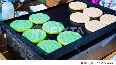 Arepas from corn meal, Venezuelan traditional fast street food 65097033