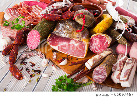 Variety of meats on table Variety of meats on table 65097467