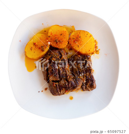 Grilled veal in chimmichurri with potatoes al Caliu 65097527