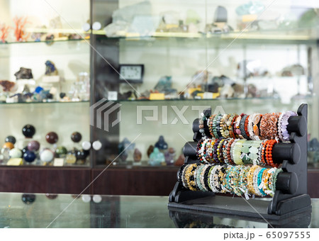 Bracelets from precious stones in jewelry store Bracelets from precious stones in jewelry store 65097555