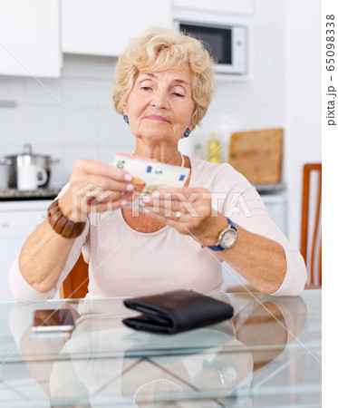 Portrait of cheerful elderly woman Portrait of cheerful elderly woman 65098338