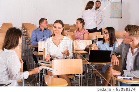 Students enjoying free time in class Students enjoying free time in class 65098374