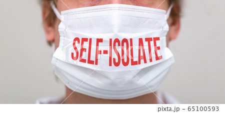 Self-isolate theme with person wearing a protective face mask 65100593