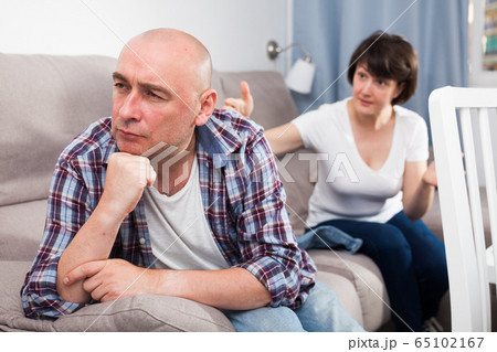 Quarrel between husband and wife in the apartment Quarrel between husband and wife in the apartment 65102167