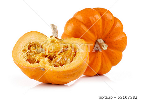 Half and whole mini pumpkin isolated 65107582