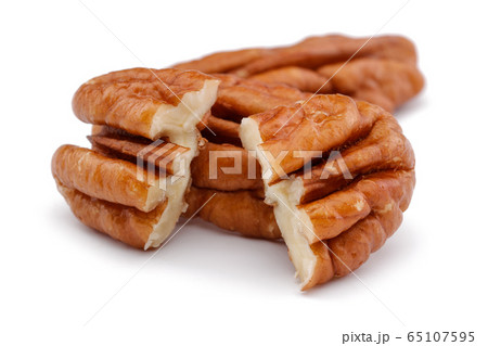 Pecan nut isolated on white Pecan nut isolated on white 65107595