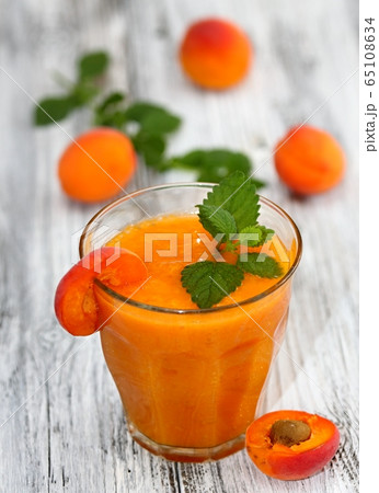 Fresh apricot  smoothie in a glass 65108634