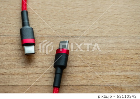 The usb type c is a hi speed data transfer and quick or fast charge battery.It a new connector port fo a computer , laptop, or cell phone.A red cable plug to notebook. The usb type c is a hi speed data transfer and quick or fast charge battery.It a new connector port fo a computer , laptop, or cell phone.A red cable plug to notebook. 65110545