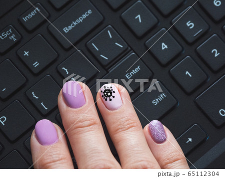 Hand on the keyboard. Creative manicure Hand on the keyboard. Creative manicure 65112304