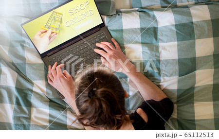 online shopping woman with laptop online shopping woman with laptop 65112513