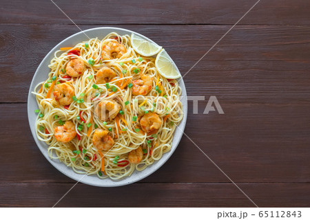 Prawn Schezwan Noodles with vegetables. Top view. Prawn Schezwan Noodles with vegetables. Top view. 65112843