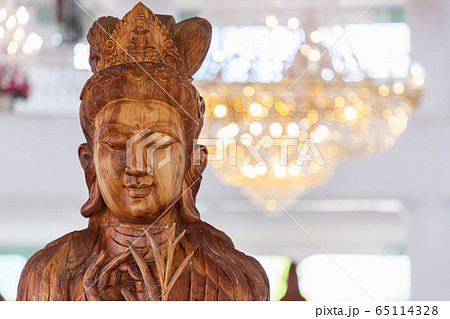 Beautiful wood statue of Guan Yin at Huay Pla Kang Temple, Chiang Rai, Thailand. 65114328