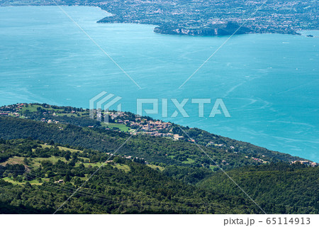Aerial view of the Lake Garda from the Monte Baldo - Italian Alps Aerial view of the Lake Garda from the Monte Baldo - Italian Alps 65114913