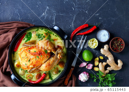 coconut milk braised chicken and baby potatoes 65115443