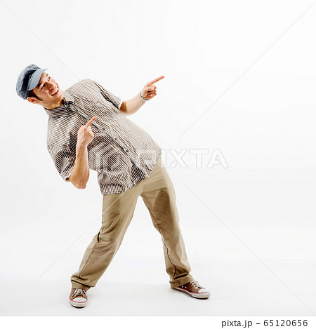 Funny man presenting against white background Funny man presenting against white background 65120656