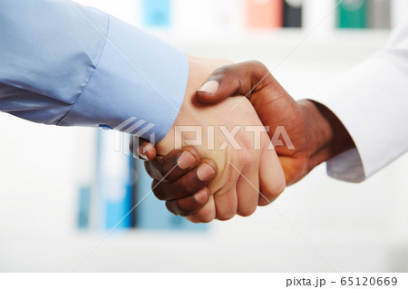 Businessmen shaking hands Businessmen shaking hands 65120669