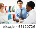 Business people working together. 65120726