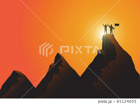 Silhouette of two men standing on top of the mountain with flag with fist raised up on sunrise background 65124055
