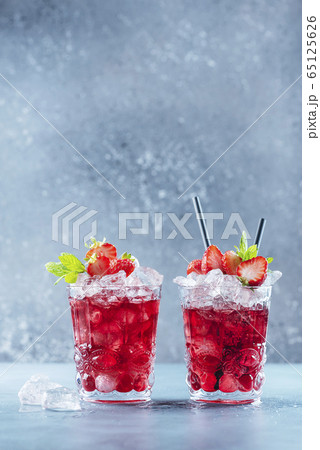 Red cocktail with ice and mint Red cocktail with ice and mint 65125626