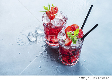 Red cocktail with ice and mint Red cocktail with ice and mint 65125642