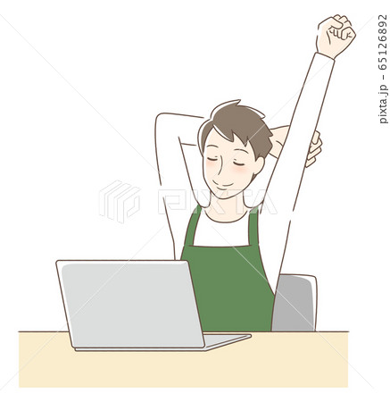 パソコンの前でストレッチをする男性 65126892