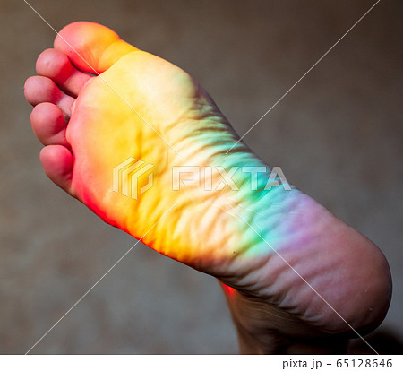 Man's foot in the color of the rainbow Man's foot in the color of the rainbow 65128646