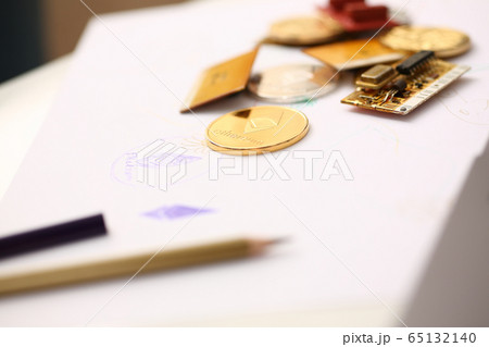 Golden ethereum coin lying at table closeup 65132140