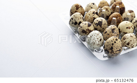 Fresh quail eggs isolated on white background with copy space Fresh quail eggs isolated on white background with copy space 65132476