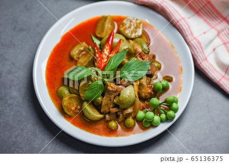 Thai food curry soup on white plate - red curry 65136375