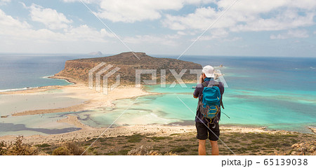 Tourist taking photo of Balos beach at Crete island in Greece 65139038