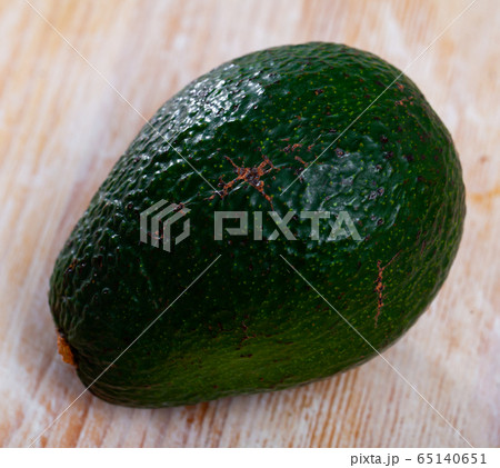 Tasty avocado on wooden surface Tasty avocado on wooden surface 65140651