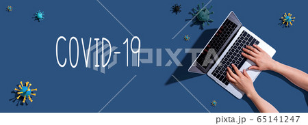 COVID-19 theme with woman using a laptop 65141247