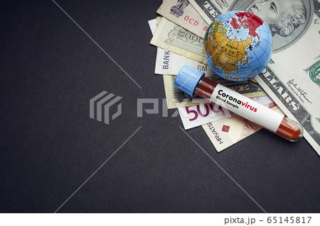 CORONAVIRUS text with currency banknotes CORONAVIRUS text with currency banknotes 65145817