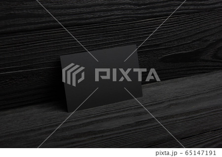 Business card blank on wooden background. Corporate Stationery, Branding Mock-up. Creative designer desk. Flat lay. Copy space for text Business card blank on wooden background. Corporate Stationery, Branding Mock-up. Creative designer desk. Flat lay. Copy space for text 65147191