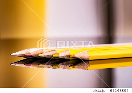 Colorful pencils on a background.  65148395