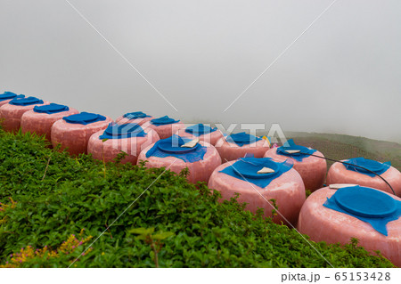 Countryside earthen jar on mountain. Countryside earthen jar on mountain. 65153428