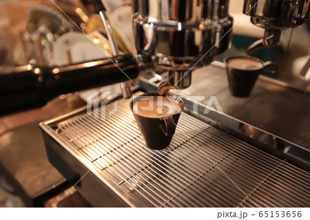 Espresso cup of hot coffee with Close-up of 65153656