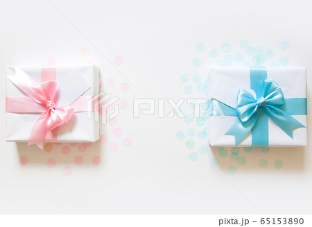 A gift for a boy and a girl at the same time. Surprise. Satin ribbon in blue and pink. 65153890