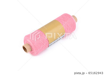 Color bobbin of yarn with label. Side view. Textile reel on isolated white background 65162943