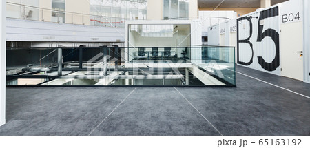 Open space office with transparent rooms, loft interior 65163192