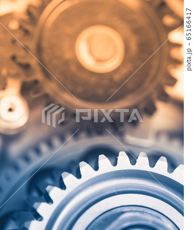 gears industrial background with warm shiny light gears industrial background with warm shiny light 65166417
